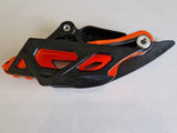 Guia de Corrente Original KTM SX/SX-F 23-.. EXC/EXC-F 24-.. Laranja/Preto
